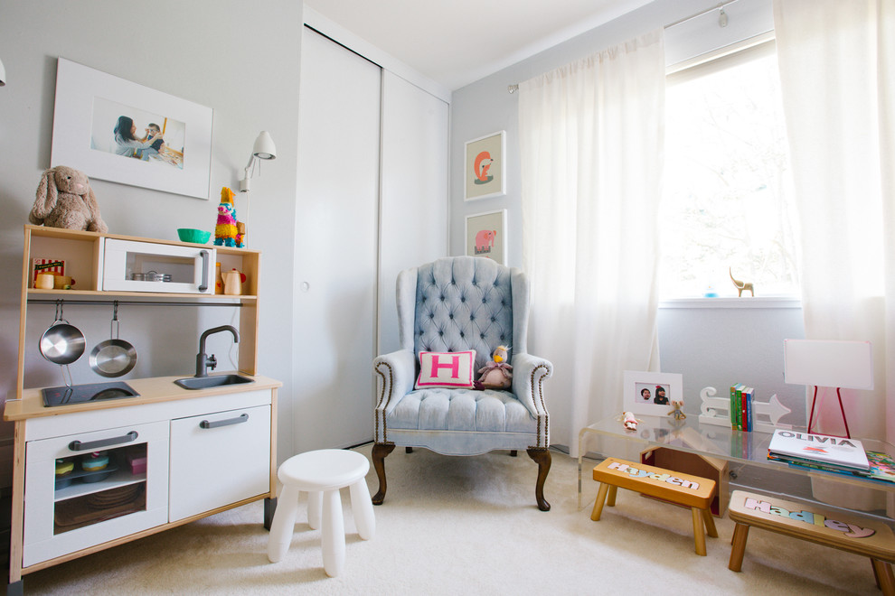 Design ideas for a mid-sized transitional kids' room for girls in San Francisco with grey walls and carpet.