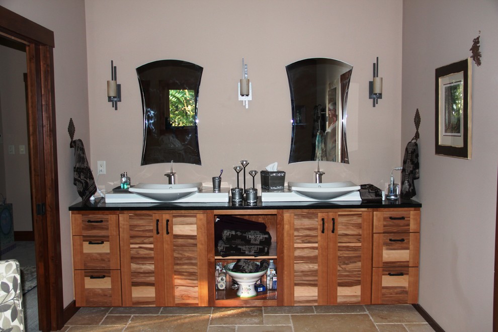 This is an example of a large modern bathroom in Chicago with light wood cabinets, beige tile, ceramic tile, ceramic floors and wood benchtops.