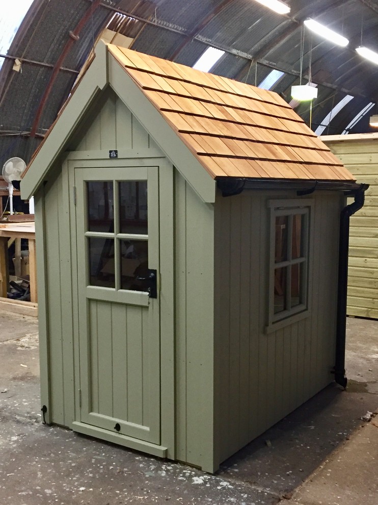 Design ideas for a small modern detached garden shed in Other.