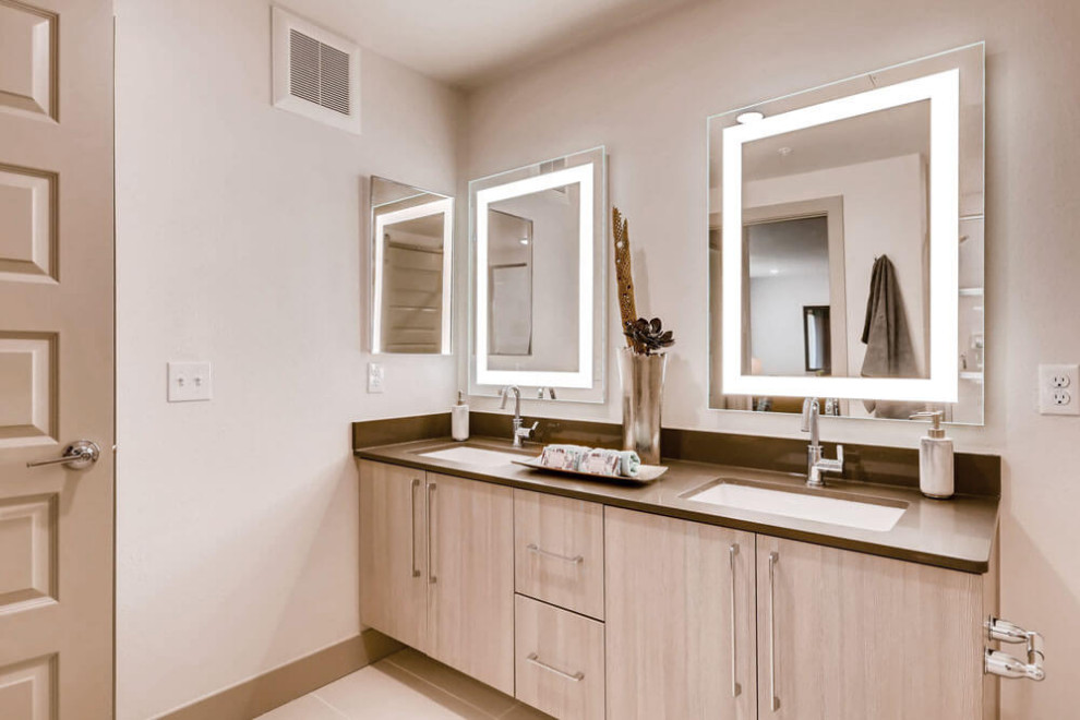Photo of a mid-sized modern bathroom in Other with ceramic floors, a drop-in sink, shaker cabinets, light wood cabinets, a double vanity, beige walls, beige floor, brown benchtops, a built-in vanity and zinc benchtops.