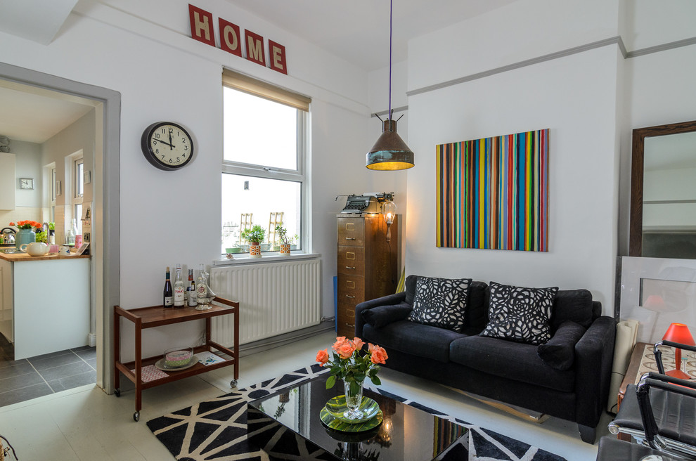 This is an example of an eclectic living room in Belfast with white walls.