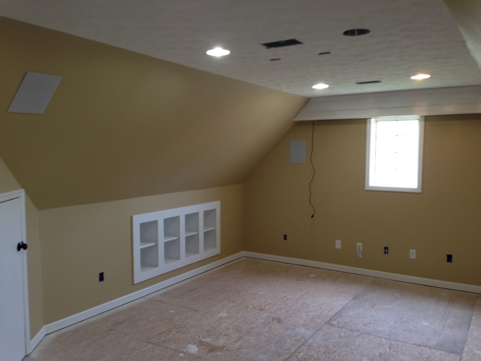 Theater room with dry bar and built ins