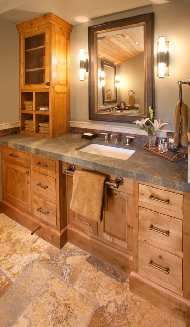 Inspiration for a large traditional bathroom in Other with an undermount sink, furniture-like cabinets, light wood cabinets, beige tile, stone tile and grey walls.