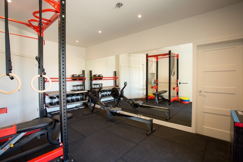 Example of a minimalist home gym design in Sussex