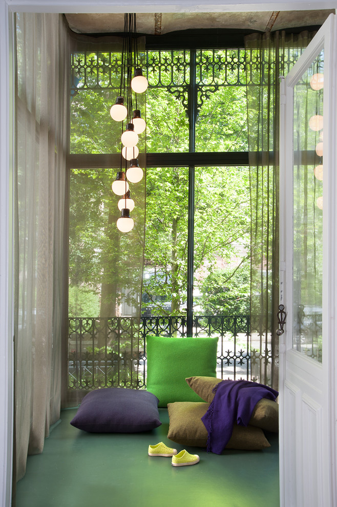 This is an example of an eclectic sunroom in Hamburg.