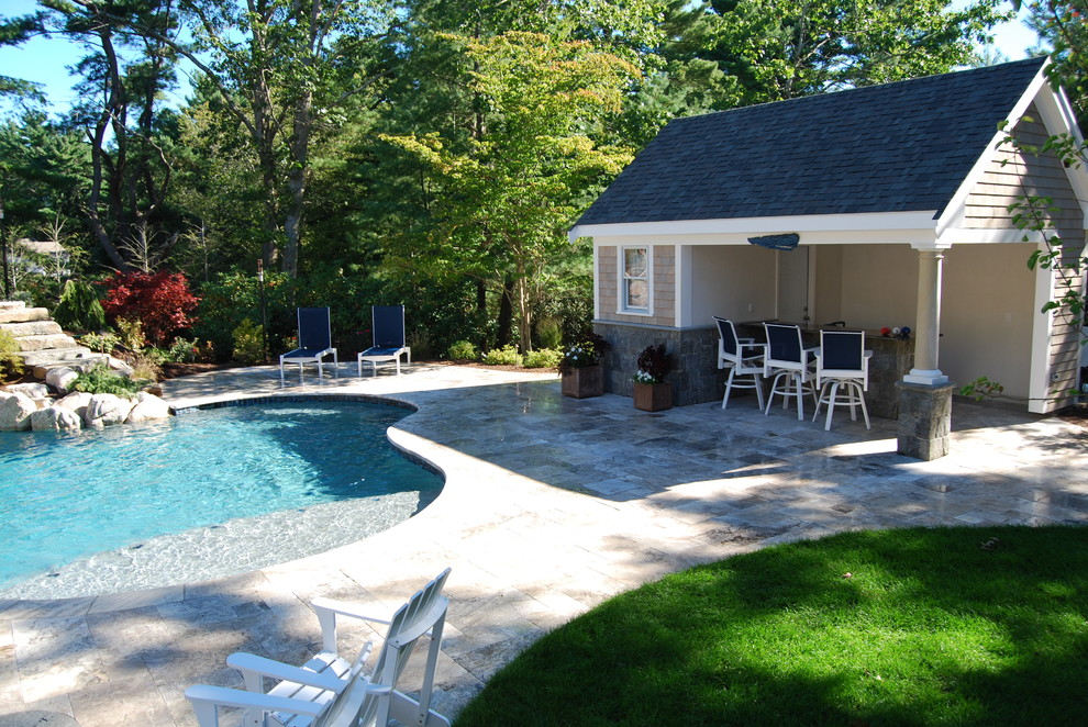 Example of a mid-sized mountain style backyard stone and kidney-shaped natural water slide design in Boston