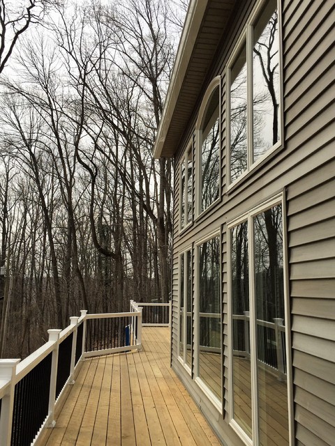 Steamboat Run, Contemporary, New life to a neglected home rustic-balcony