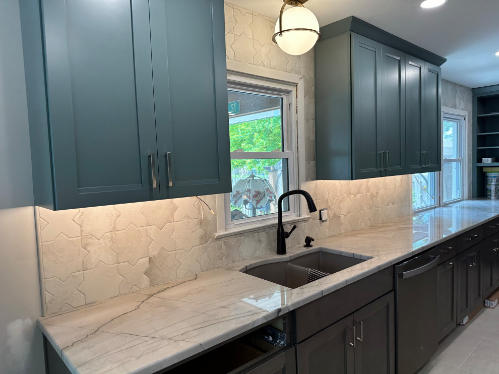 Example of a large transitional galley porcelain tile and beige floor eat-in kitchen design in Omaha with a double-bowl sink, recessed-panel cabinets, turquoise cabinets, quartzite countertops, white backsplash, porcelain backsplash, stainless steel appliances, no island and white countertops
