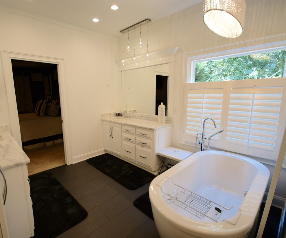 Design ideas for a contemporary bathroom in Atlanta with white walls and ceramic floors.