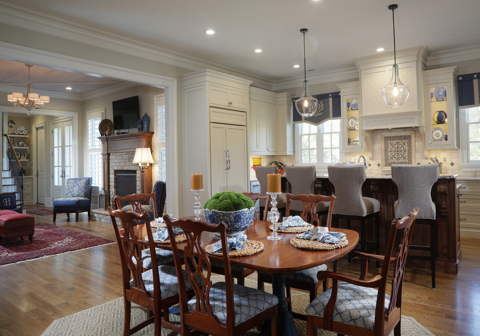 Inspiration for a mid-sized traditional separate dining room in Atlanta with grey walls, medium hardwood floors and no fireplace.