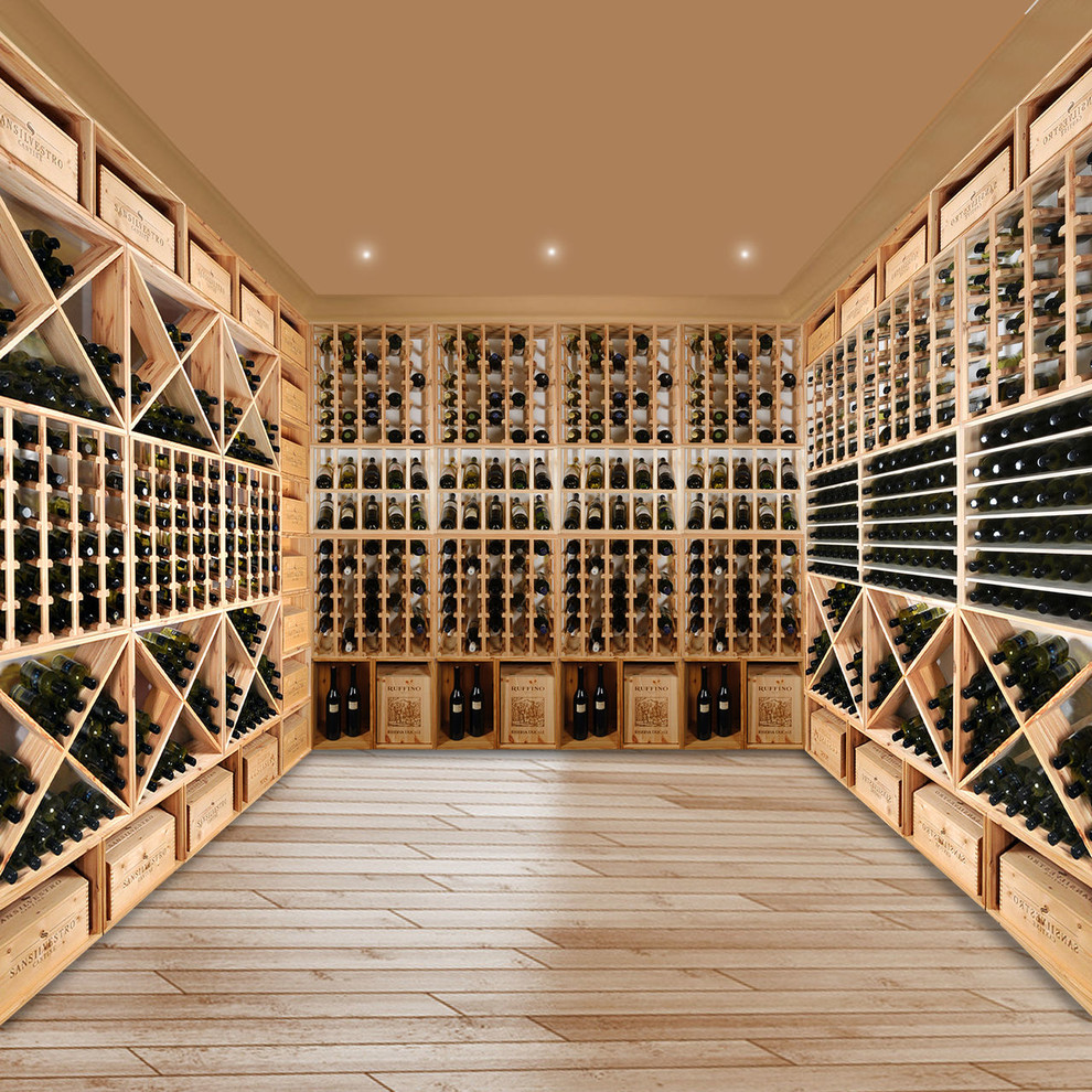 Design ideas for a large traditional wine cellar in Frankfurt with concrete floors and diamond bins.