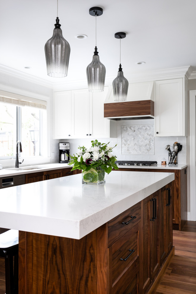 Example of a transitional kitchen design in Vancouver