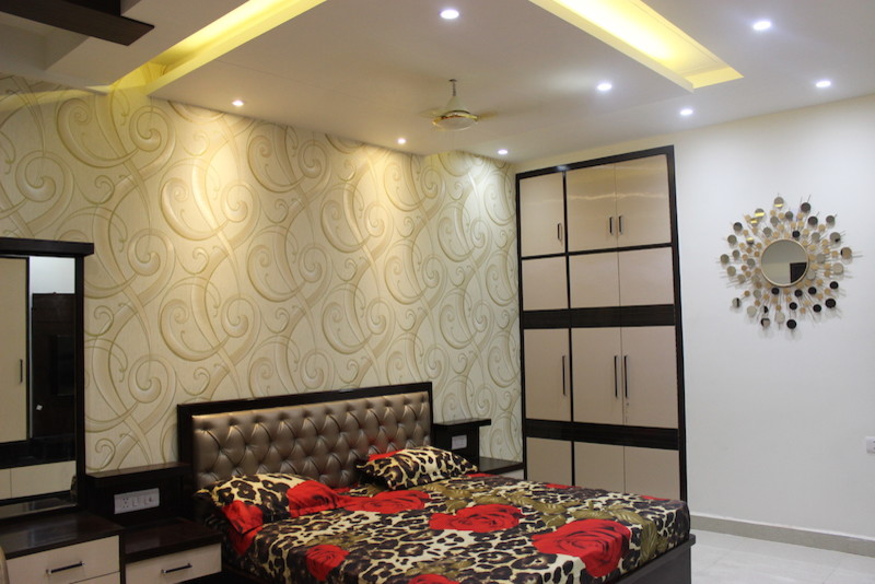 Design ideas for a contemporary bedroom in Delhi.