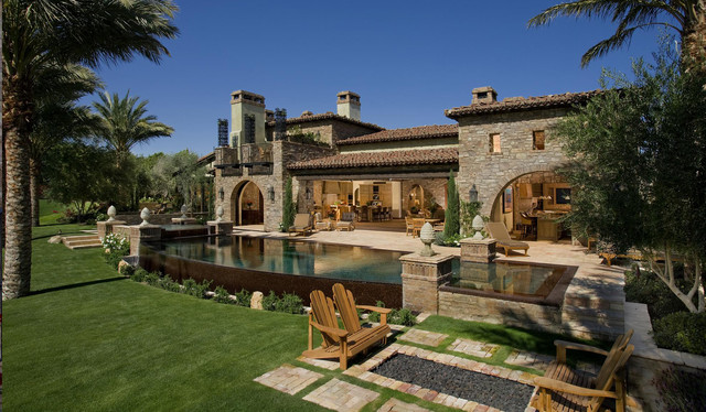 Stone Backyard Exterior mediterranean-pool
