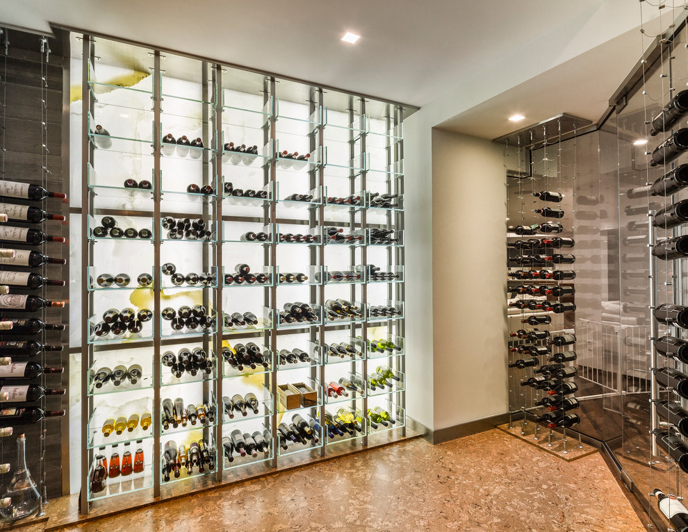Design ideas for a contemporary wine cellar in Toronto with storage racks and cork floors.