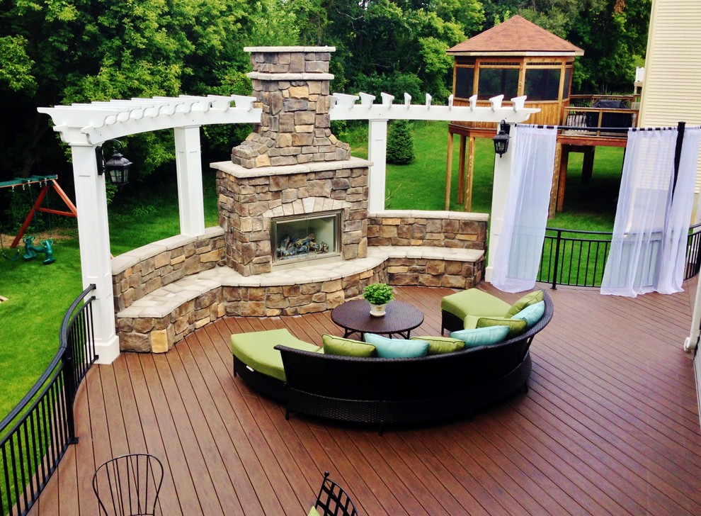 Inspiration for a traditional deck in Minneapolis with a pergola.