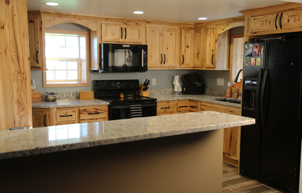 Example of a mountain style kitchen design in Cedar Rapids