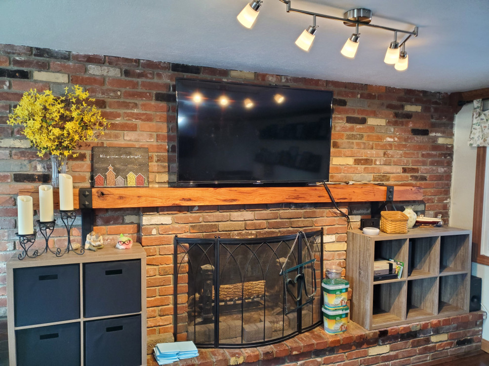Inspiration for a mid-sized rustic living room remodel in Philadelphia with a shiplap fireplace