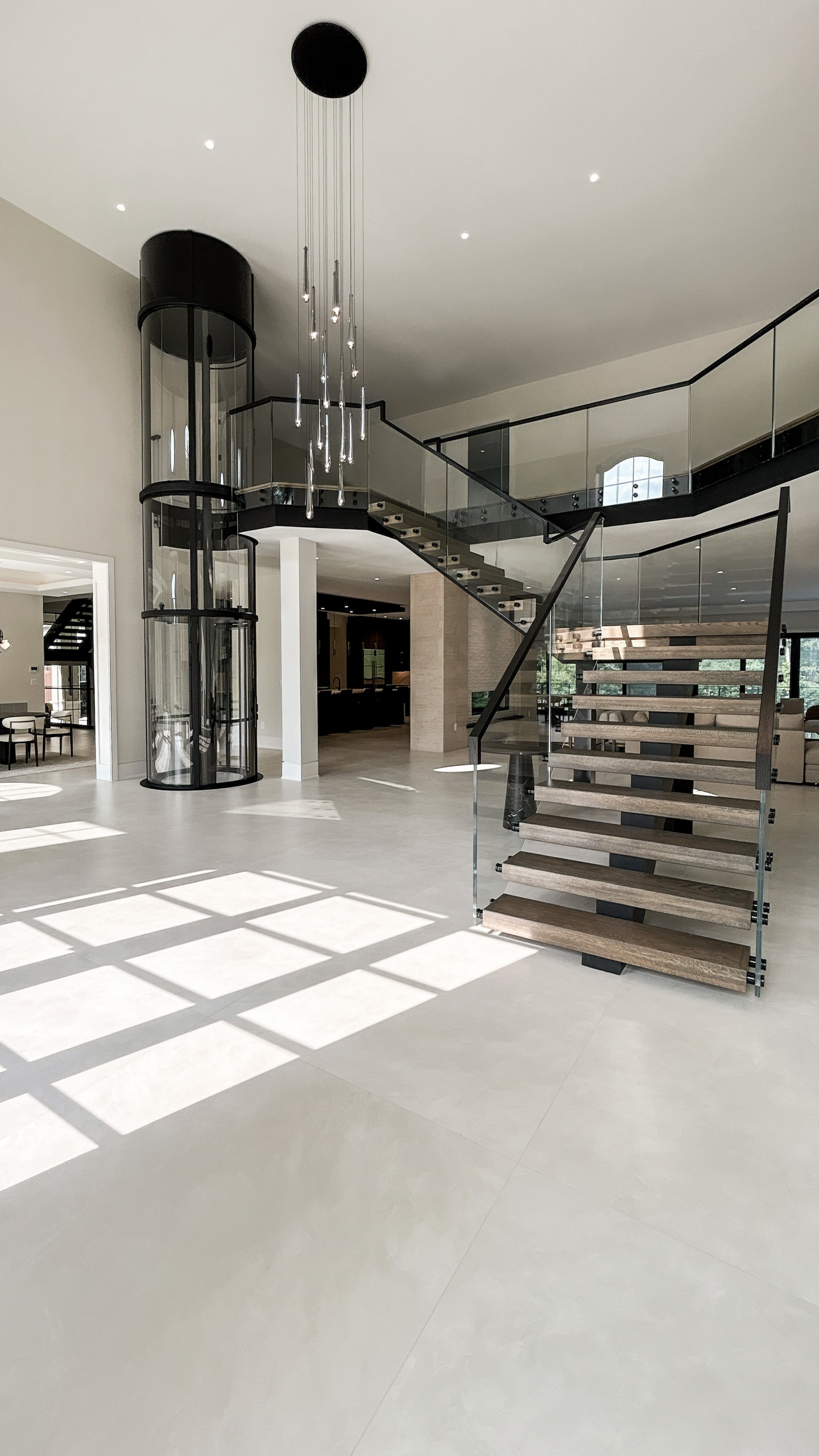 Project #159 | Modern Foyer Stair with Stand-off Glass Railing