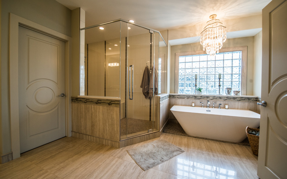 Photo of an expansive transitional master bathroom in Calgary with an undermount sink, shaker cabinets, white cabinets, engineered quartz benchtops, a freestanding tub, a double shower, beige tile, porcelain tile, beige walls and travertine floors.