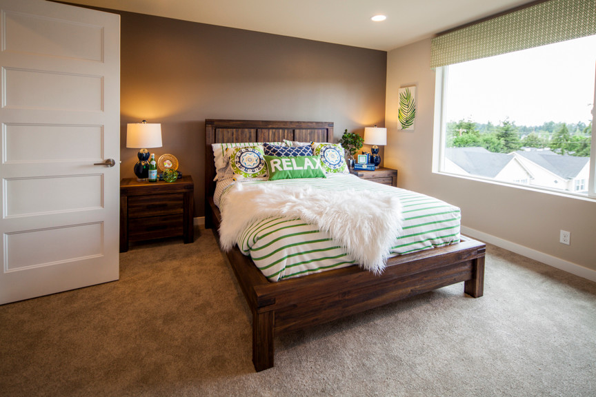 This is an example of a contemporary bedroom in Seattle.