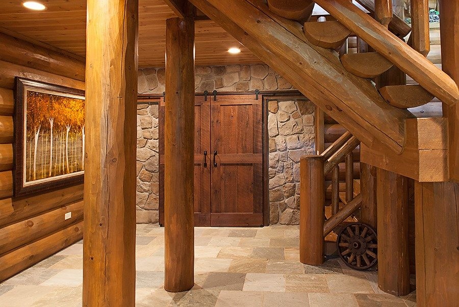 Inspiration for a mid-sized country wood l-shaped staircase in Other with wood risers.