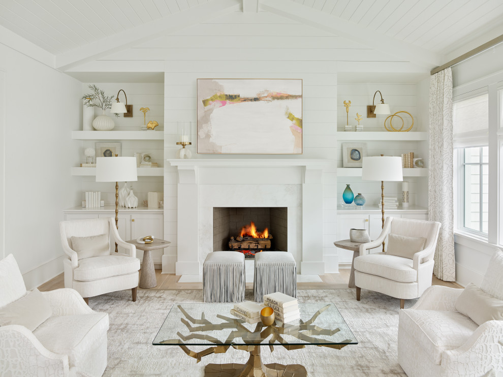 Mid-sized transitional formal open concept living room in Charleston with white walls, light hardwood floors, a standard fireplace, a stone fireplace surround and beige floor.