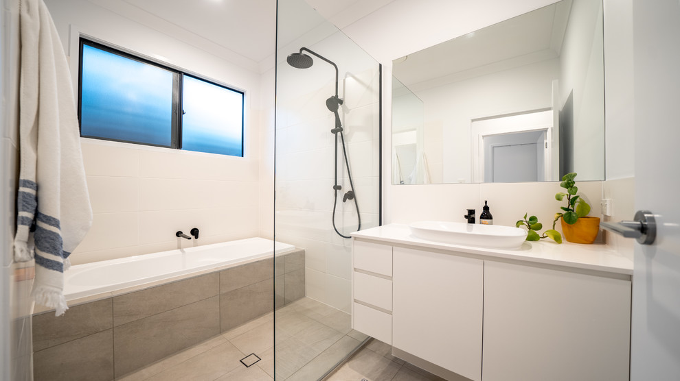 Contemporary master wet room bathroom in Brisbane with beige cabinets, an alcove tub, white walls, a drop-in sink, beige floor, an open shower, beige benchtops and flat-panel cabinets.