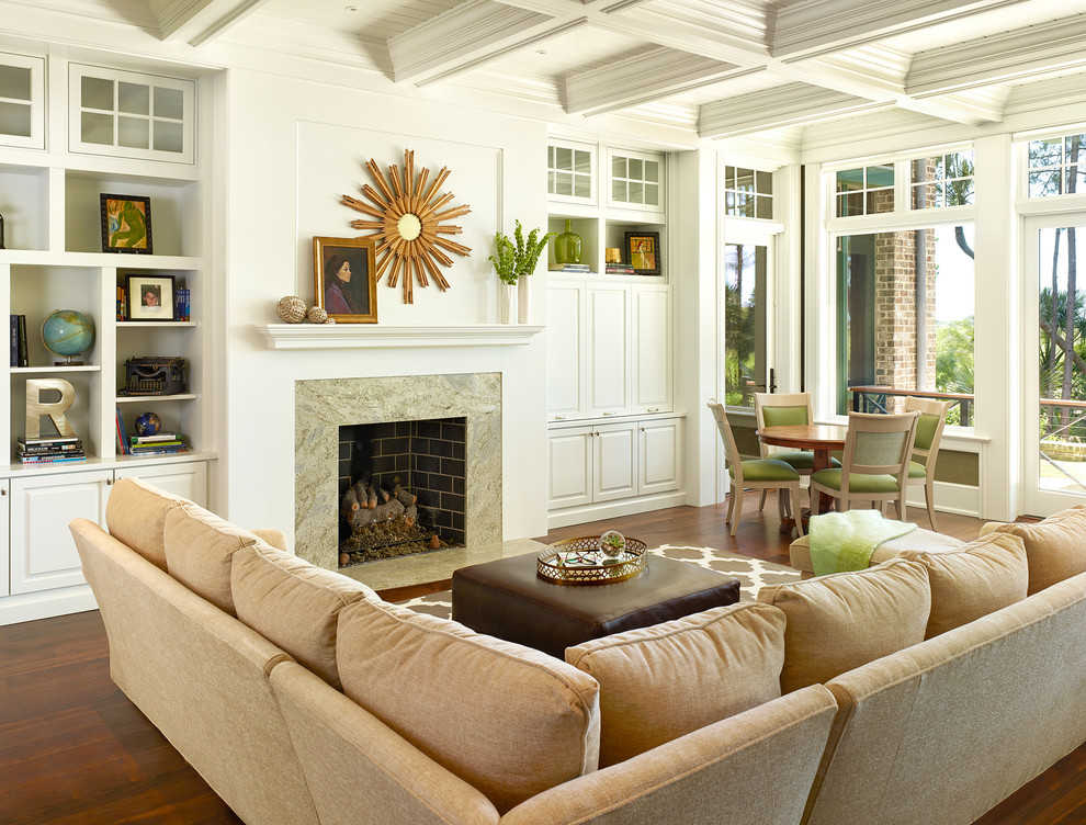 Photo of a transitional living room in Charleston with a standard fireplace.