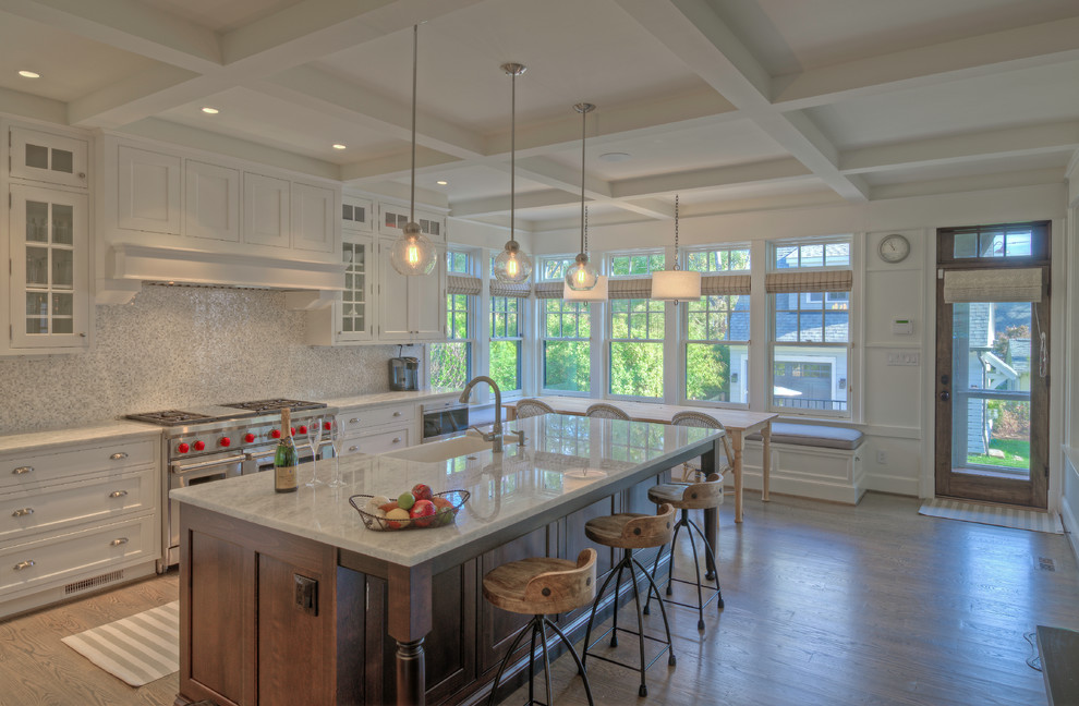 Design ideas for a large transitional l-shaped open plan kitchen in DC Metro with a farmhouse sink, recessed-panel cabinets, white cabinets, quartzite benchtops, stainless steel appliances, light hardwood floors and with island.