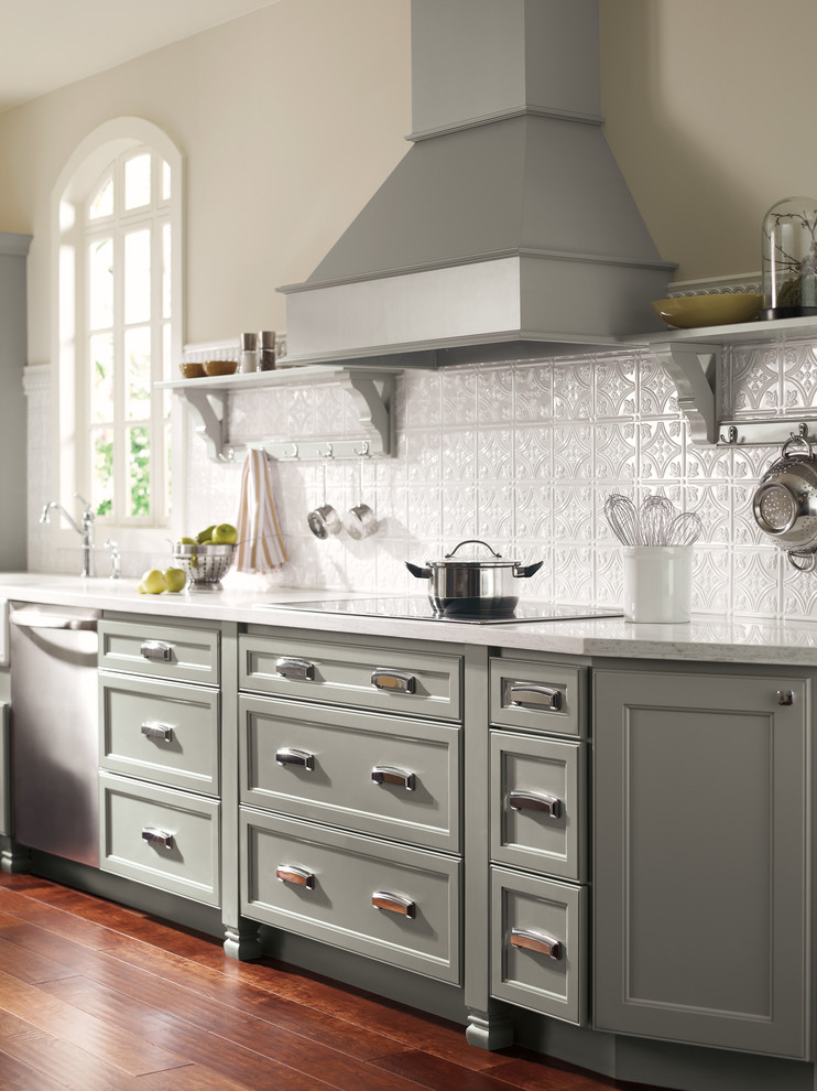 Eat-in kitchen - transitional dark wood floor and brown floor eat-in kitchen idea with shaker cabinets, gray cabinets, stainless steel appliances and white countertops