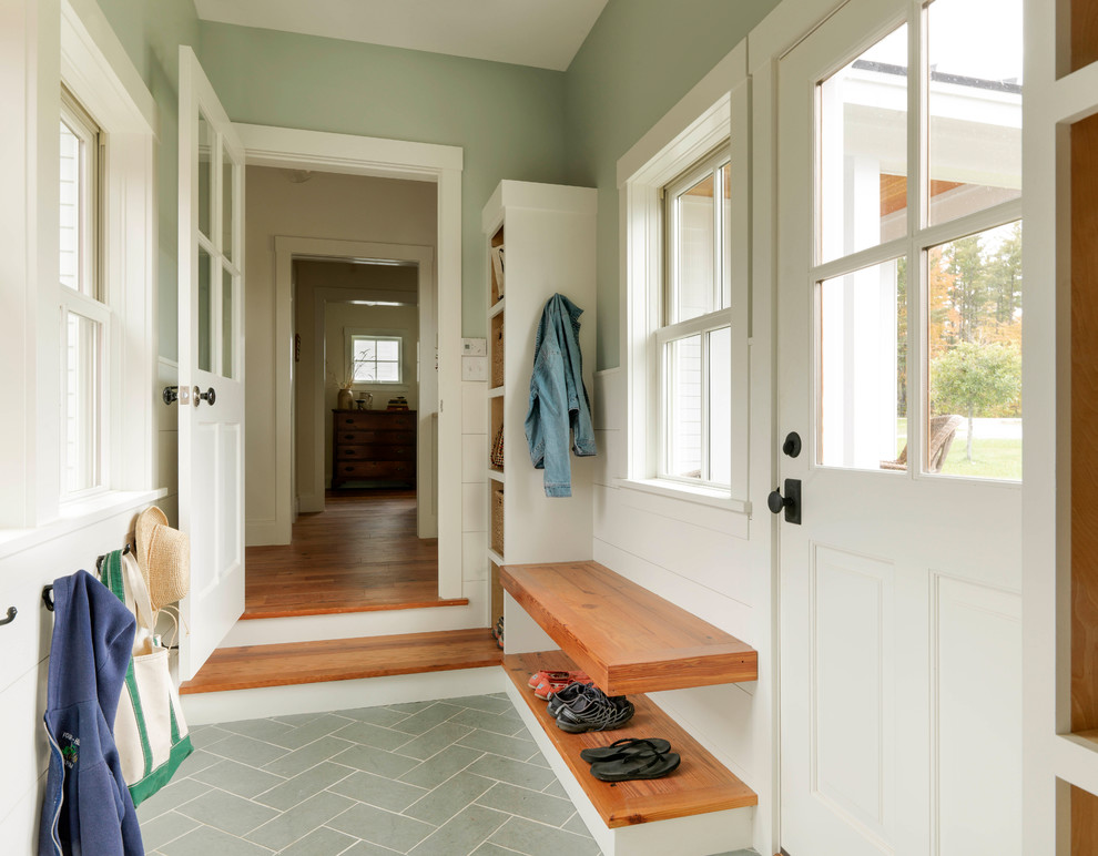 Photo of a country mudroom in Burlington with grey walls, a single front door and a white front door.