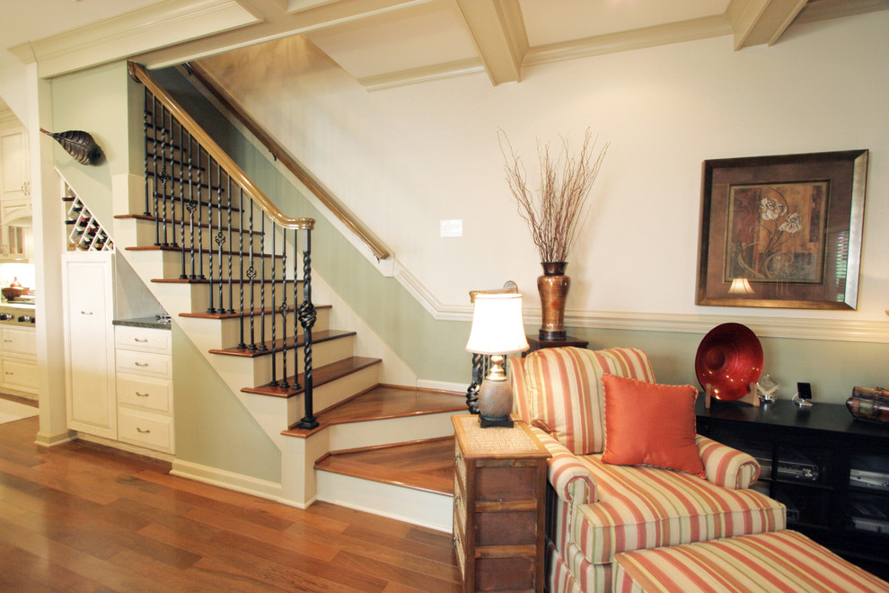 Design ideas for a mid-sized traditional wood straight staircase in Raleigh with painted wood risers.