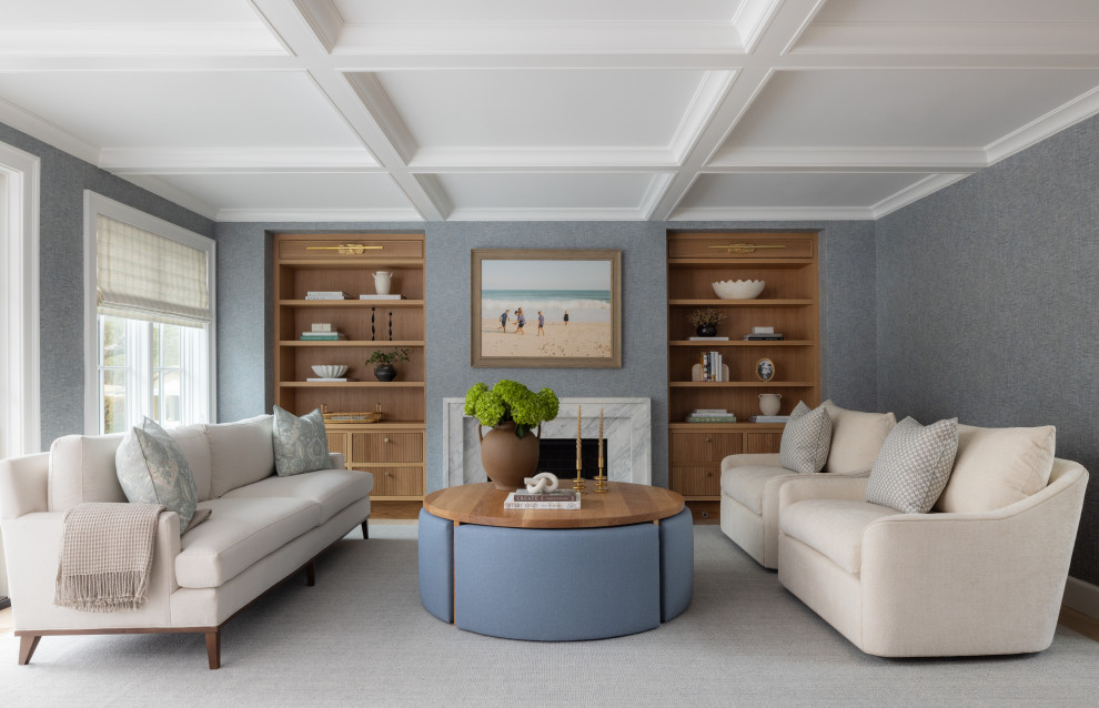 Living room - mid-sized transitional formal and enclosed vaulted ceiling and wallpaper living room idea in New York with blue walls, a standard fireplace and a stone fireplace