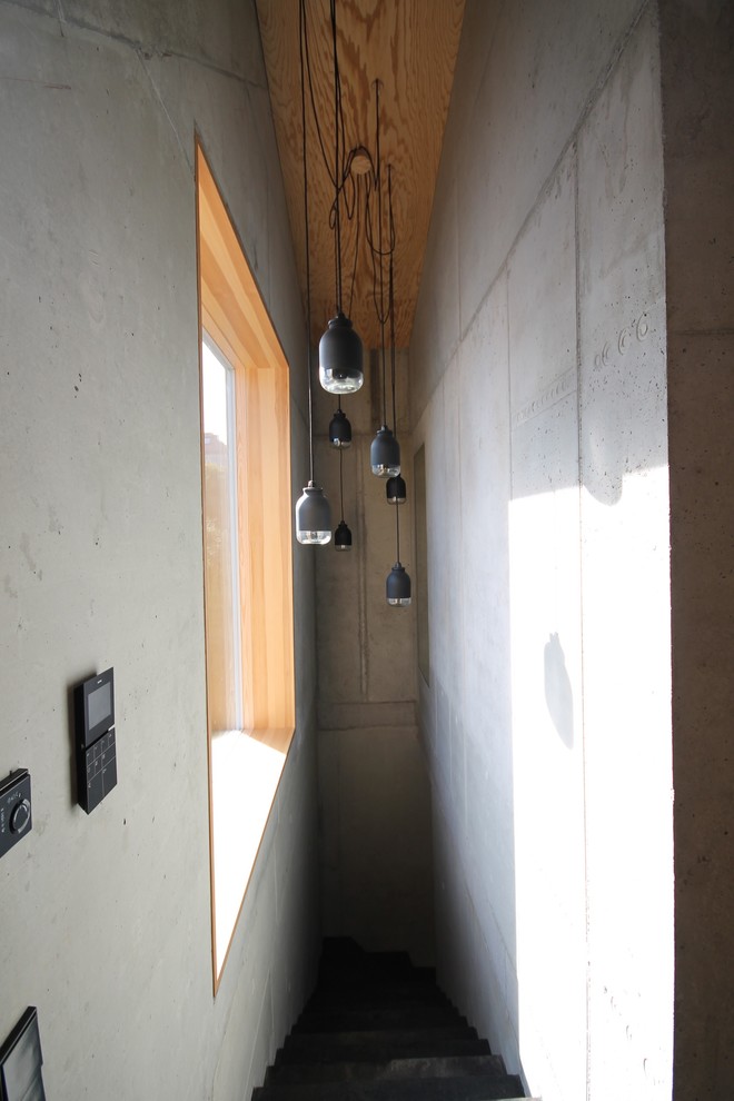 Moderne Betontreppe in L-Form mit Beton-Setzstufen in Stuttgart