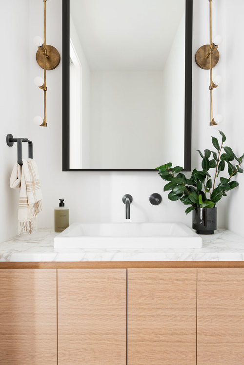 Photo of a mid-sized modern kids bathroom in Salt Lake City with light wood cabinets, a corner shower, white walls, marble benchtops, a hinged shower door and multi-coloured benchtops.