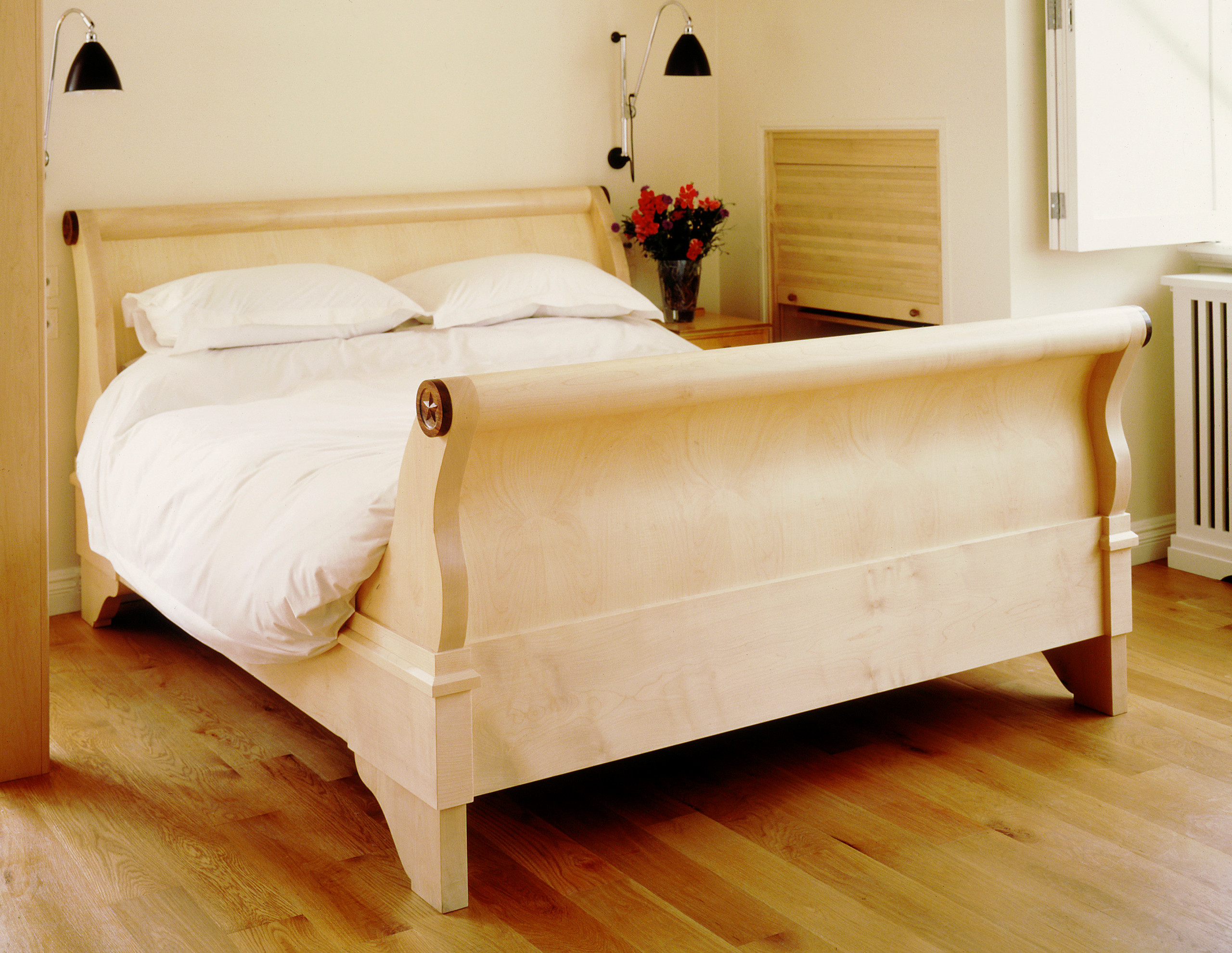 Ripple, figured sycamore veneered and solid sycamore lit bateau bed