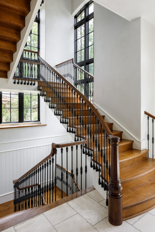 Example of a huge classic wooden floating mixed material railing staircase design in Other with wooden risers