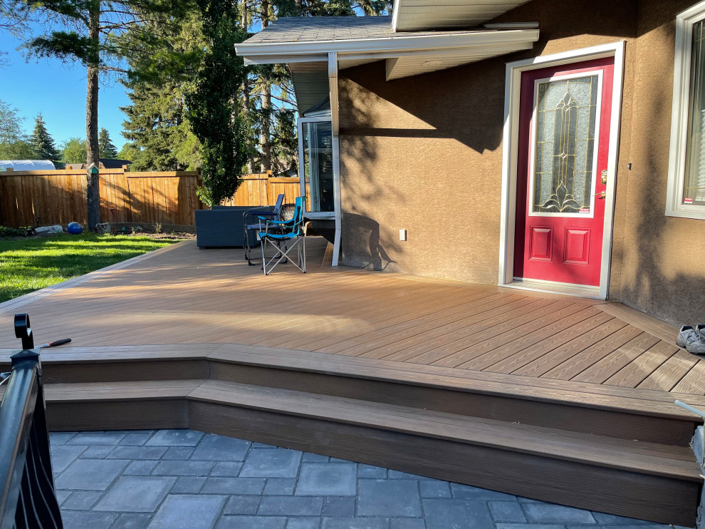 Example of a mid-sized backyard deck design in Edmonton