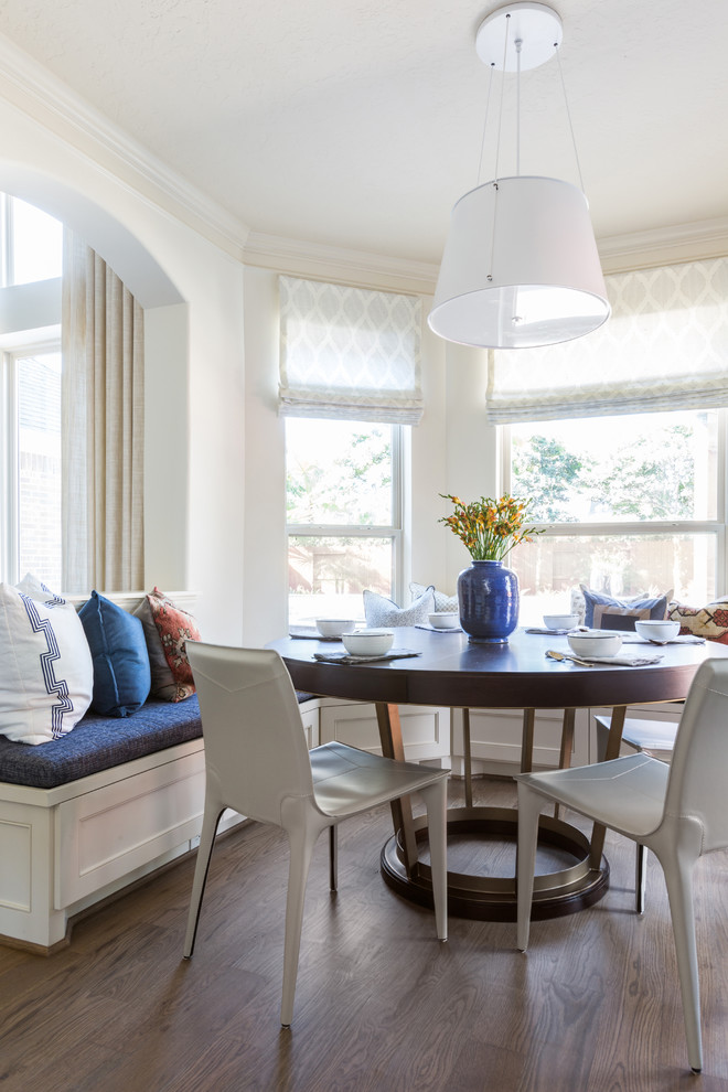 Inspiration for a transitional dark wood floor and brown floor dining room remodel in Houston with white walls