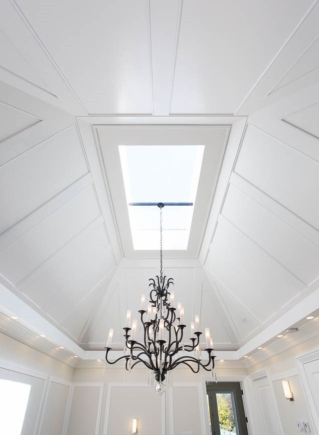 Example of a large transitional foyer design in Toronto with beige walls