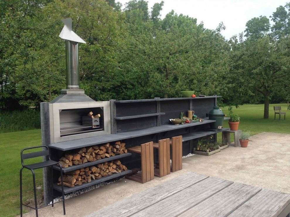 Inspiration for a contemporary patio in Moscow with an outdoor kitchen.