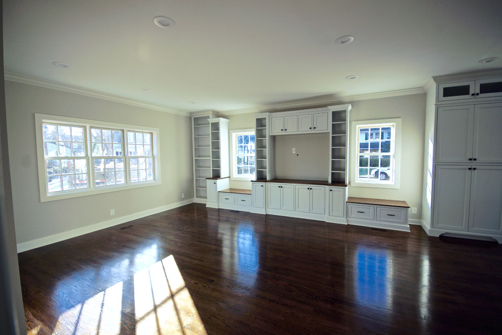 Large transitional formal open concept living room in Cincinnati with brown floor, beige walls, dark hardwood floors, no fireplace and no tv.