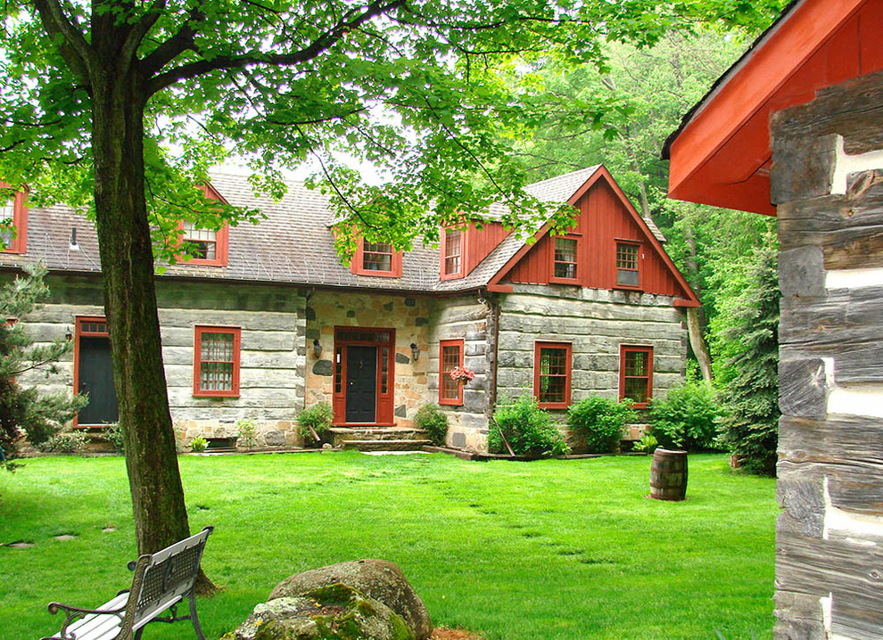Inspiration for a rustic two-story gable roof remodel in Toronto