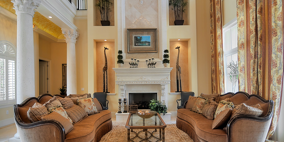 Inspiration for a mid-sized mediterranean formal open concept living room in Orlando with beige walls, a standard fireplace, a concrete fireplace surround, no tv and beige floor.