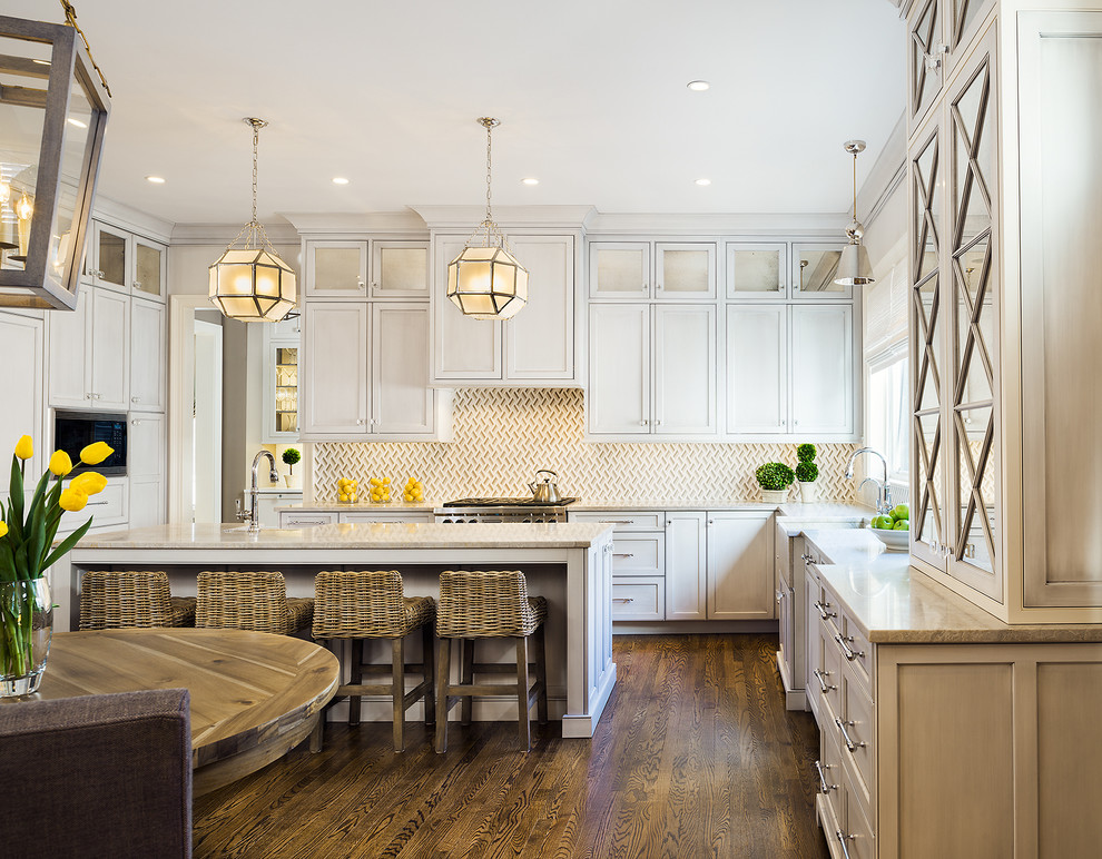 Design ideas for a transitional u-shaped eat-in kitchen in DC Metro with a farmhouse sink, shaker cabinets, white cabinets, beige splashback, dark hardwood floors and with island.