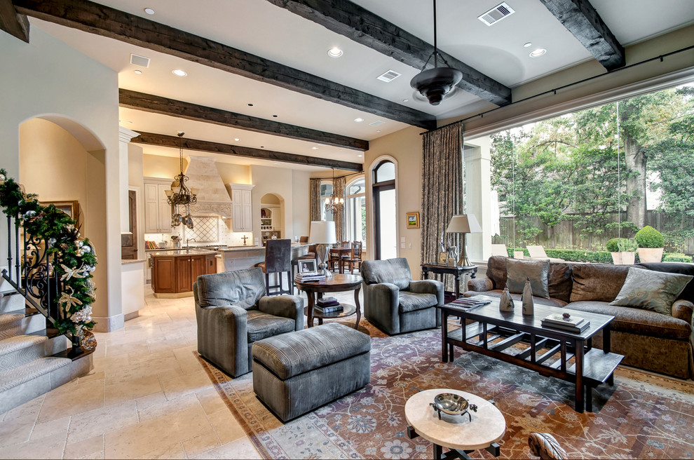 Photo of a large traditional formal open concept living room in Houston with beige walls, travertine floors, a standard fireplace, a stone fireplace surround and a wall-mounted tv.