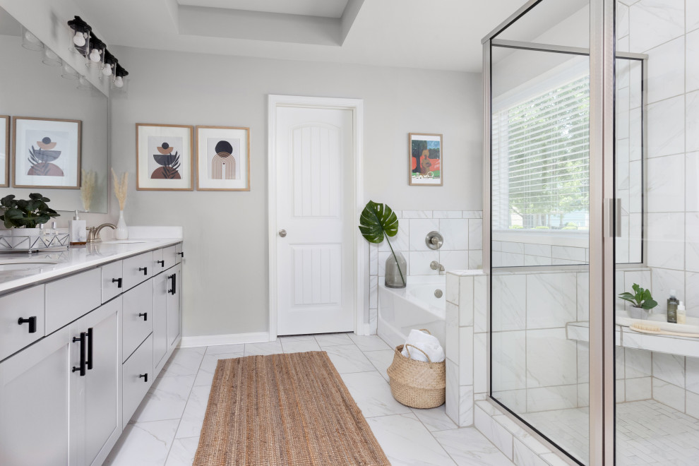 Inspiration for a large modern master bathroom in Atlanta with shaker cabinets, grey cabinets, a hot tub, a one-piece toilet, grey walls, porcelain floors, a drop-in sink, engineered quartz benchtops, white floor, white benchtops, a shower seat, a double vanity, a built-in vanity and recessed.