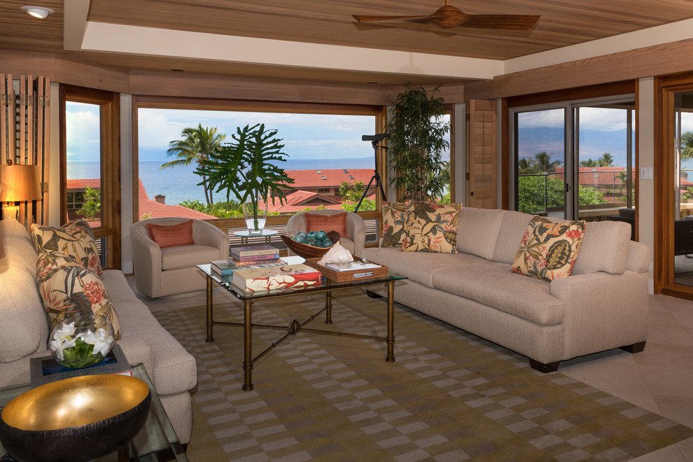This is an example of a tropical living room in Other.