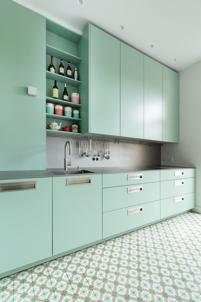 Inspiration for a mid-sized contemporary single-wall separate kitchen in Frankfurt with an integrated sink, flat-panel cabinets, turquoise cabinets, stainless steel benchtops, grey splashback, metal splashback, black appliances, turquoise floor, grey benchtop and no island.
